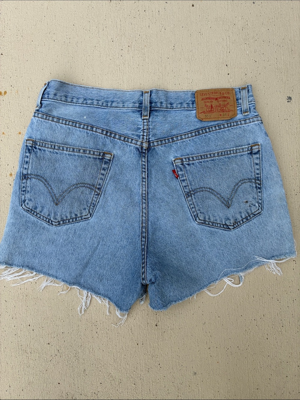 Levi’s cut-off and frayed jean shorts 3” inseam and 34 waist